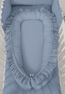 Cocoon baby nest with a ruffle – pastel blue