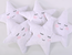Star-shaped cuddle pillow with a rattle – white
